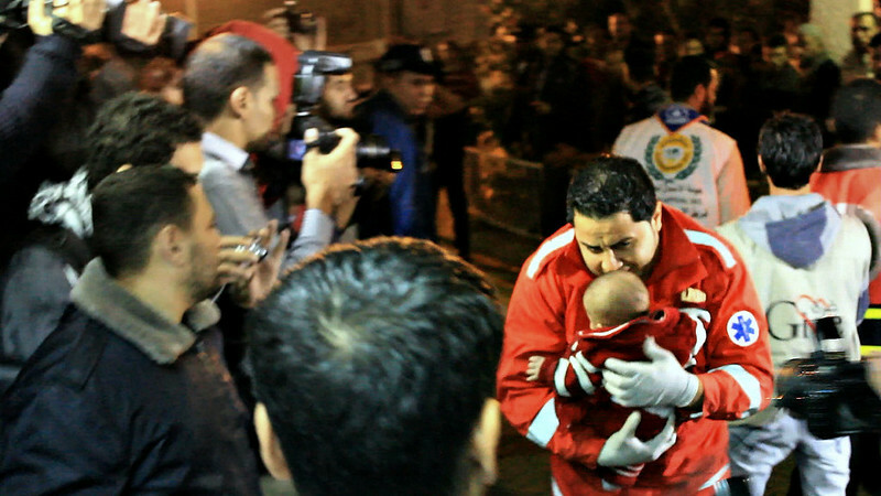 加薩地區發生戰爭,讓婦女與幼童更加無助。(Photo by Gigi Ibrahim on Flickr used under Creative Commons license)